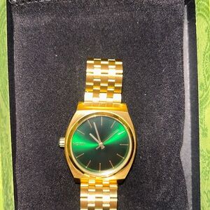 Nixon Men's Watch with Gold Band and Green Dial